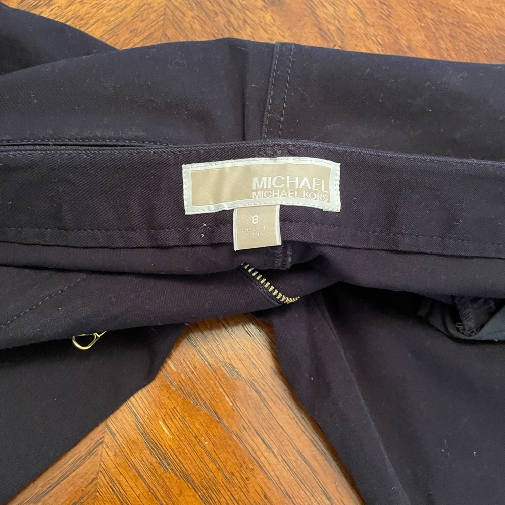 Michael Kors, size 8 black pants. Used good condition.Gold zipper and buttons - Picture 6 of 6